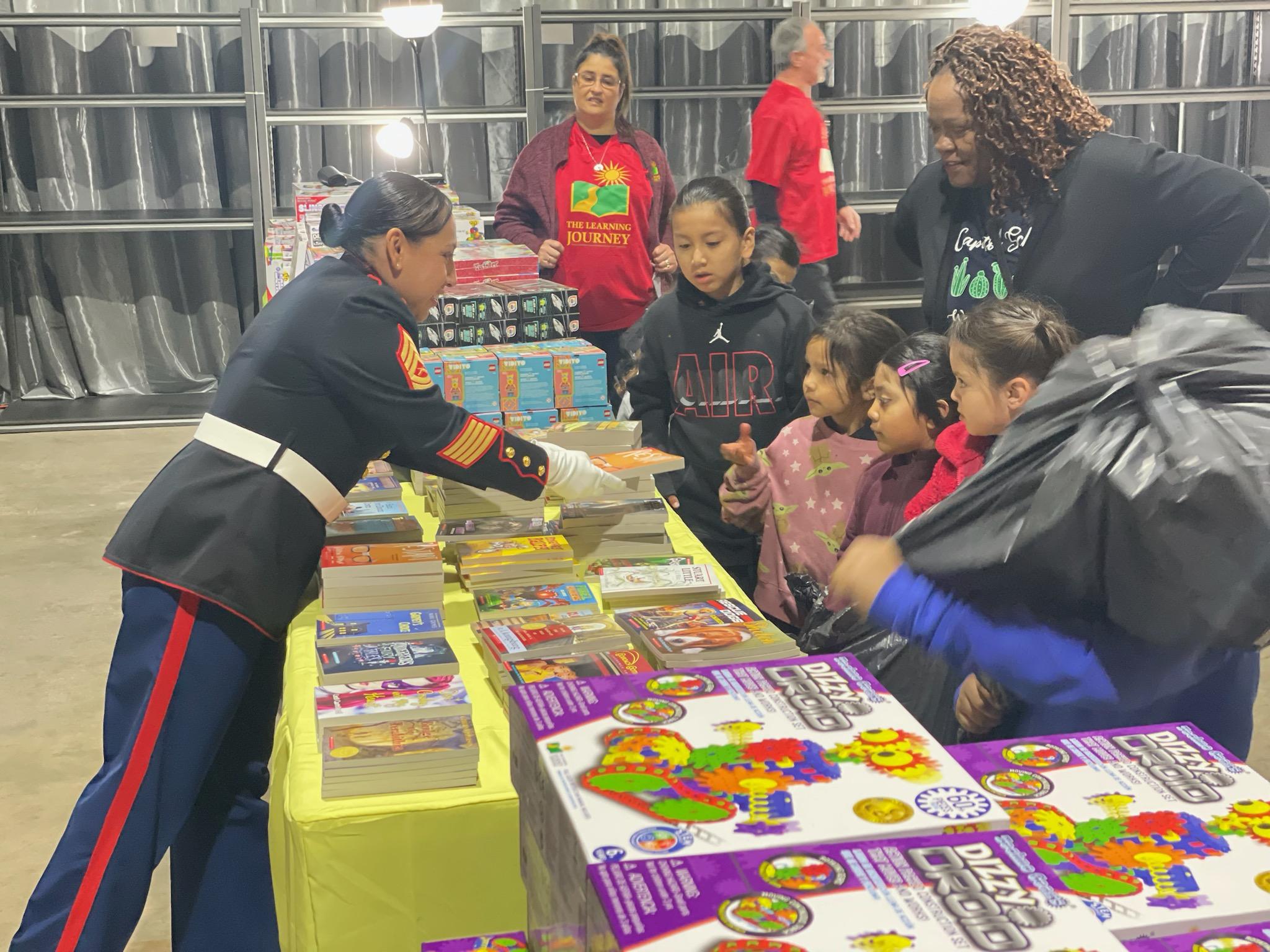 Help Toys for Tots Turn the Page on Poverty for Children in Need 