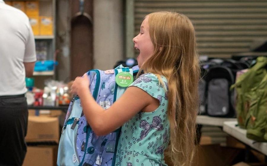 Marine Toys for Tots Fills Backpacks with Possibilities for Children in Need